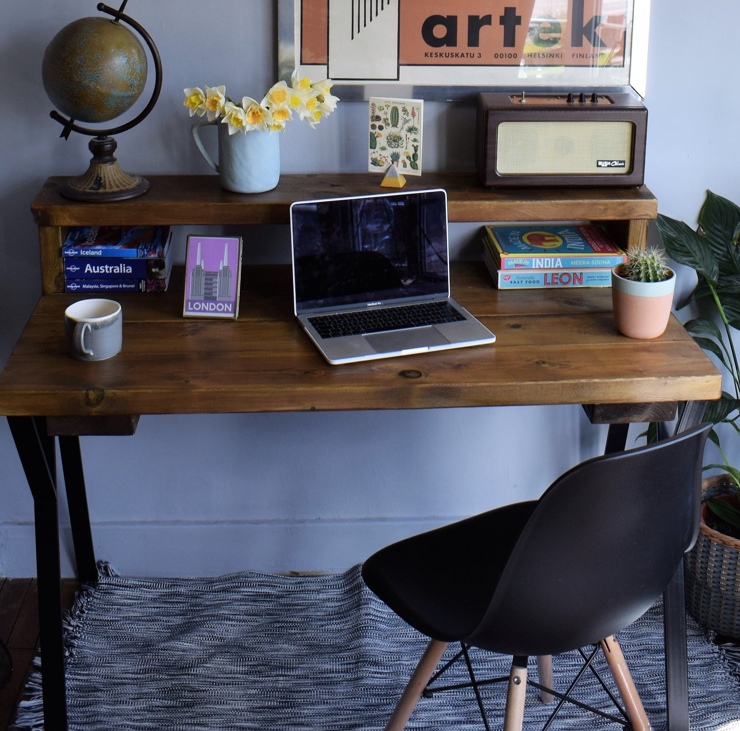 Industrial Redwood Pine desk with black steel legs, featuring a mid-century modern design and deep shelf riser. Ideal for home office setups, the handcrafted desk combines natural wood with sleek industrial steel for a stylish, functional workspace