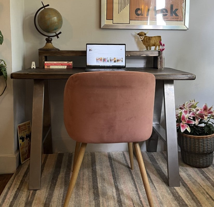 Industrial redwood pine desk with steel A-frame legs and a convenient shelf, perfect for modern home office spaces