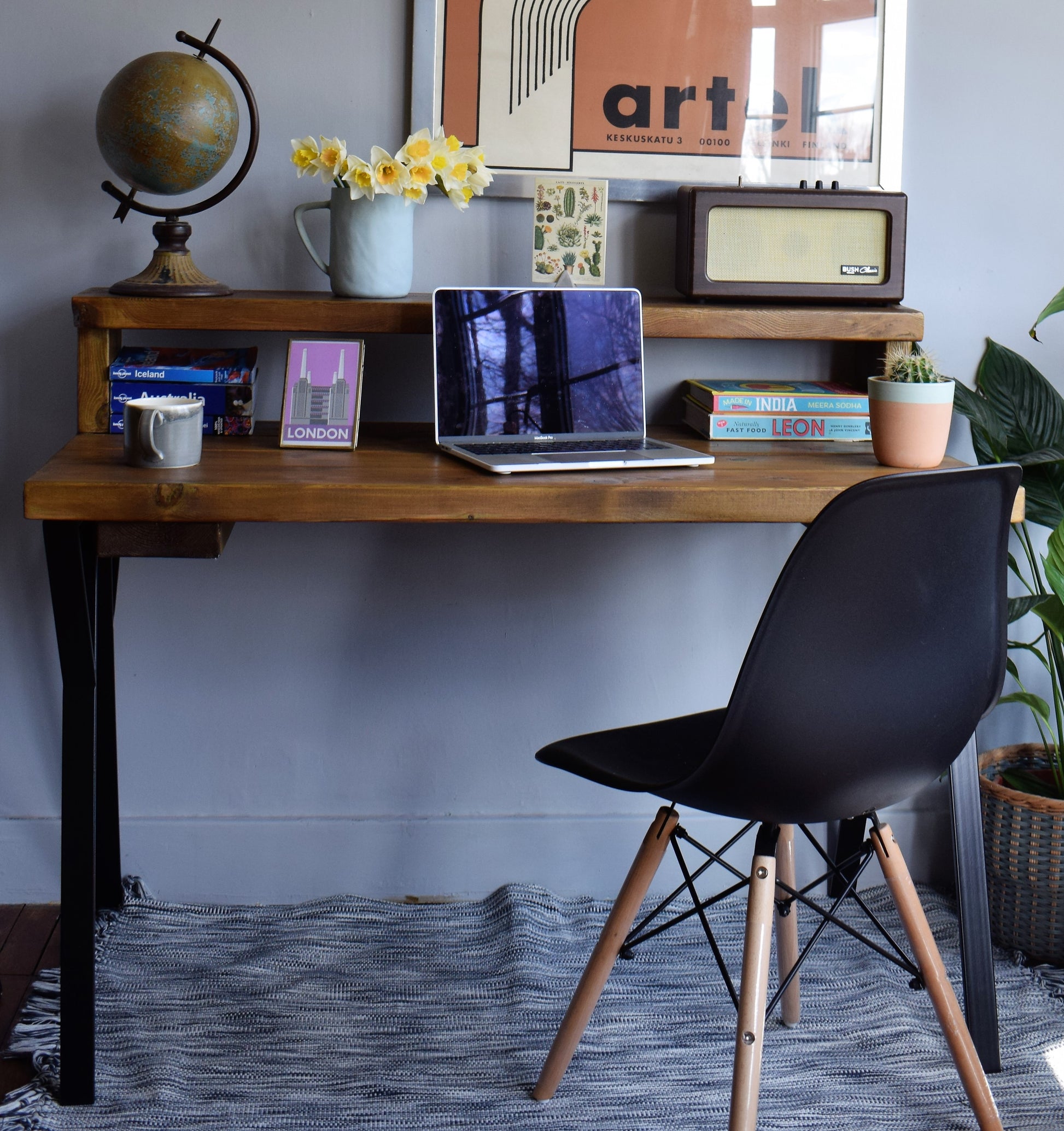 Industrial Redwood Pine desk with black steel legs, featuring a mid-century modern design and deep shelf riser. Ideal for home office setups, the handcrafted desk combines natural wood with sleek industrial steel for a stylish, functional workspace