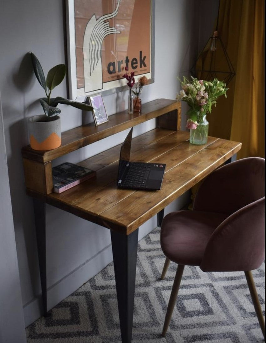 Industrial reclaimed pine desk with black T-shape steel legs and riser shelf