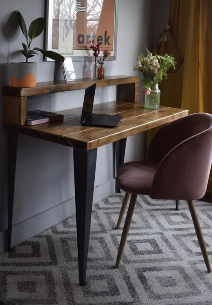 Industrial reclaimed pine desk with black T-shape steel legs and riser shelf