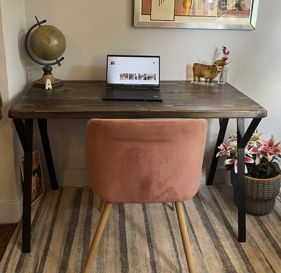 Industrial redwood pine desk with black steel legs and ebony finish, perfect for mid-century modern home office décor