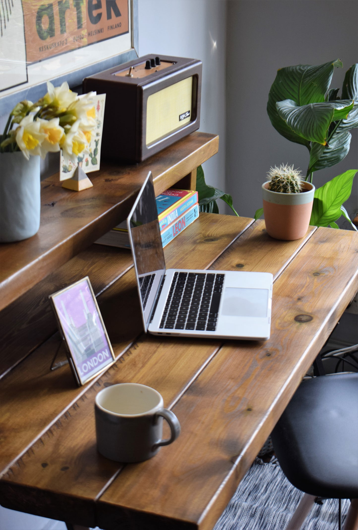 Industrial Redwood Pine desk with black steel legs, featuring a mid-century modern design and deep shelf riser. Ideal for home office setups, the handcrafted desk combines natural wood with sleek industrial steel for a stylish, functional workspace