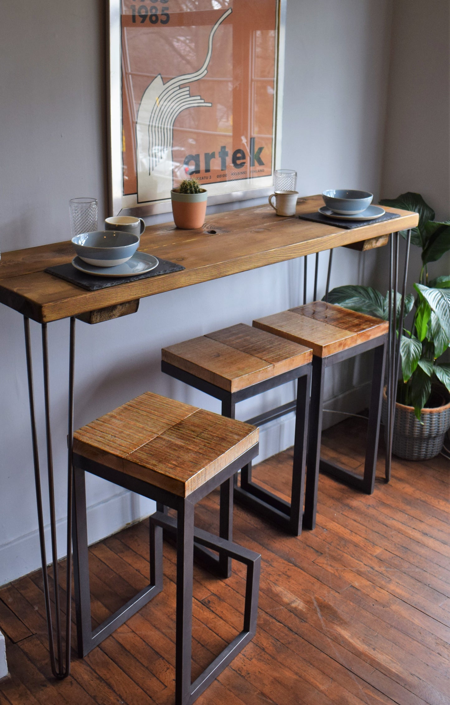 Industrial mid-century modern Scandi-style breakfast bar with hairpin legs, crafted from reclaimed wood for a stylish, eco-friendly home