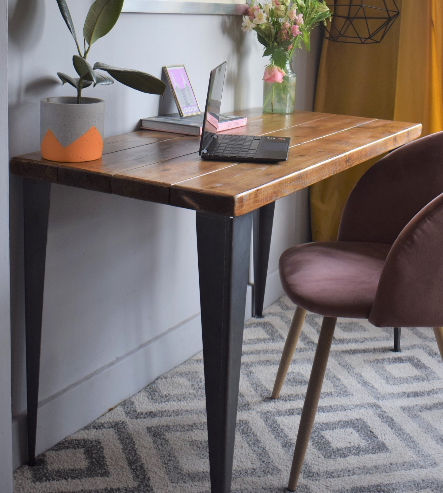 Reclaimed pine desk with T-shaped black steel legs