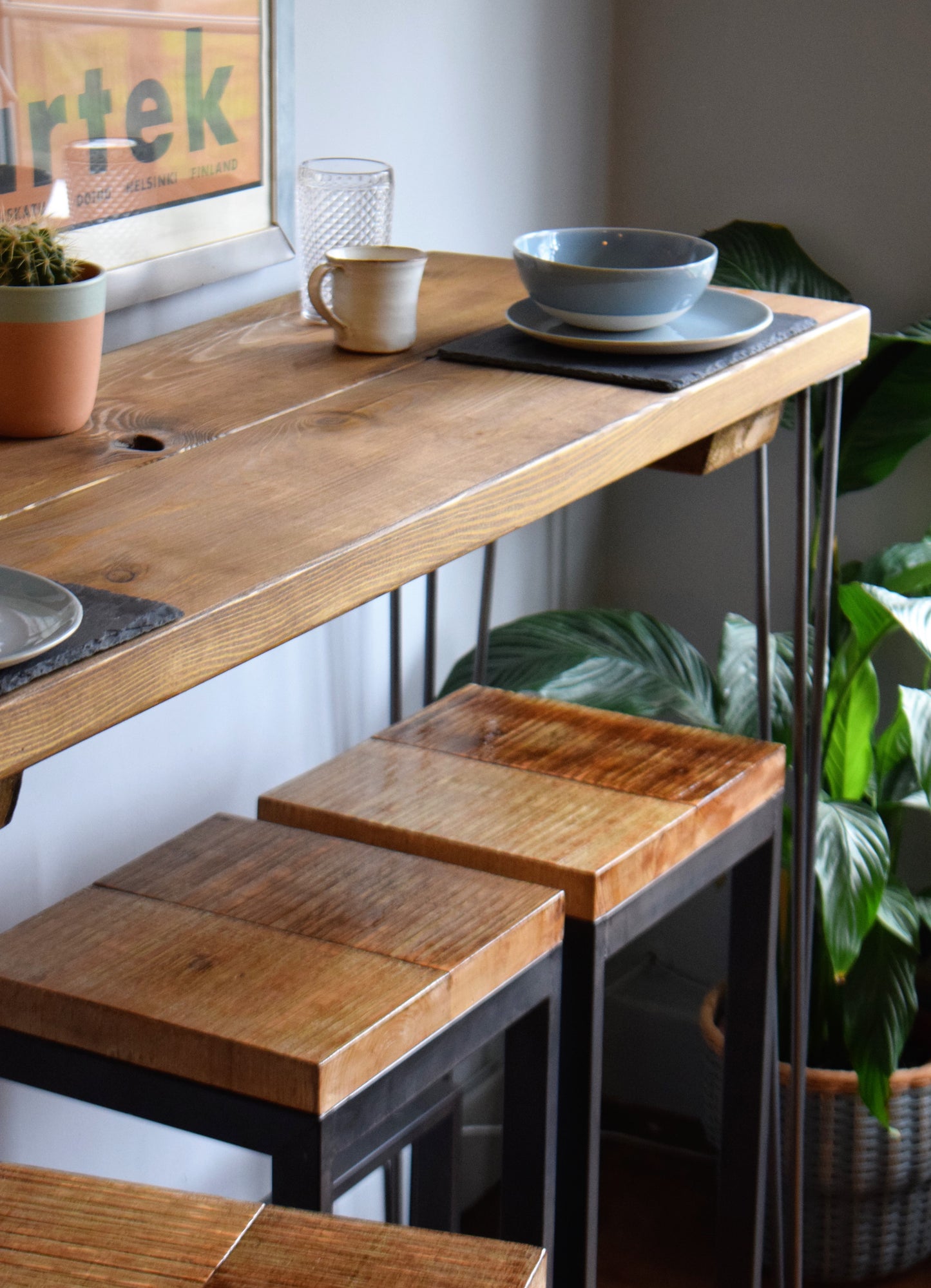 Industrial mid-century modern Scandi-style breakfast bar with hairpin legs, crafted from reclaimed wood for a stylish, eco-friendly home