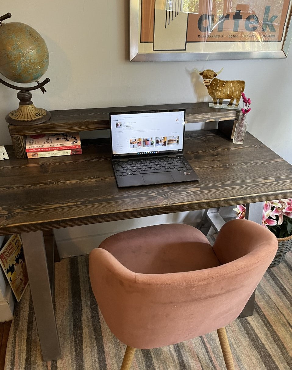 Industrial redwood pine desk with steel A-frame legs and a convenient shelf, perfect for modern home office spaces