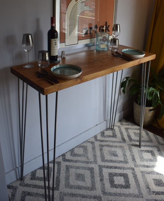 Industrial mid-century modern Scandi breakfast bar with sleek hairpin legs, perfect for a stylish and minimalist kitchen or dining area