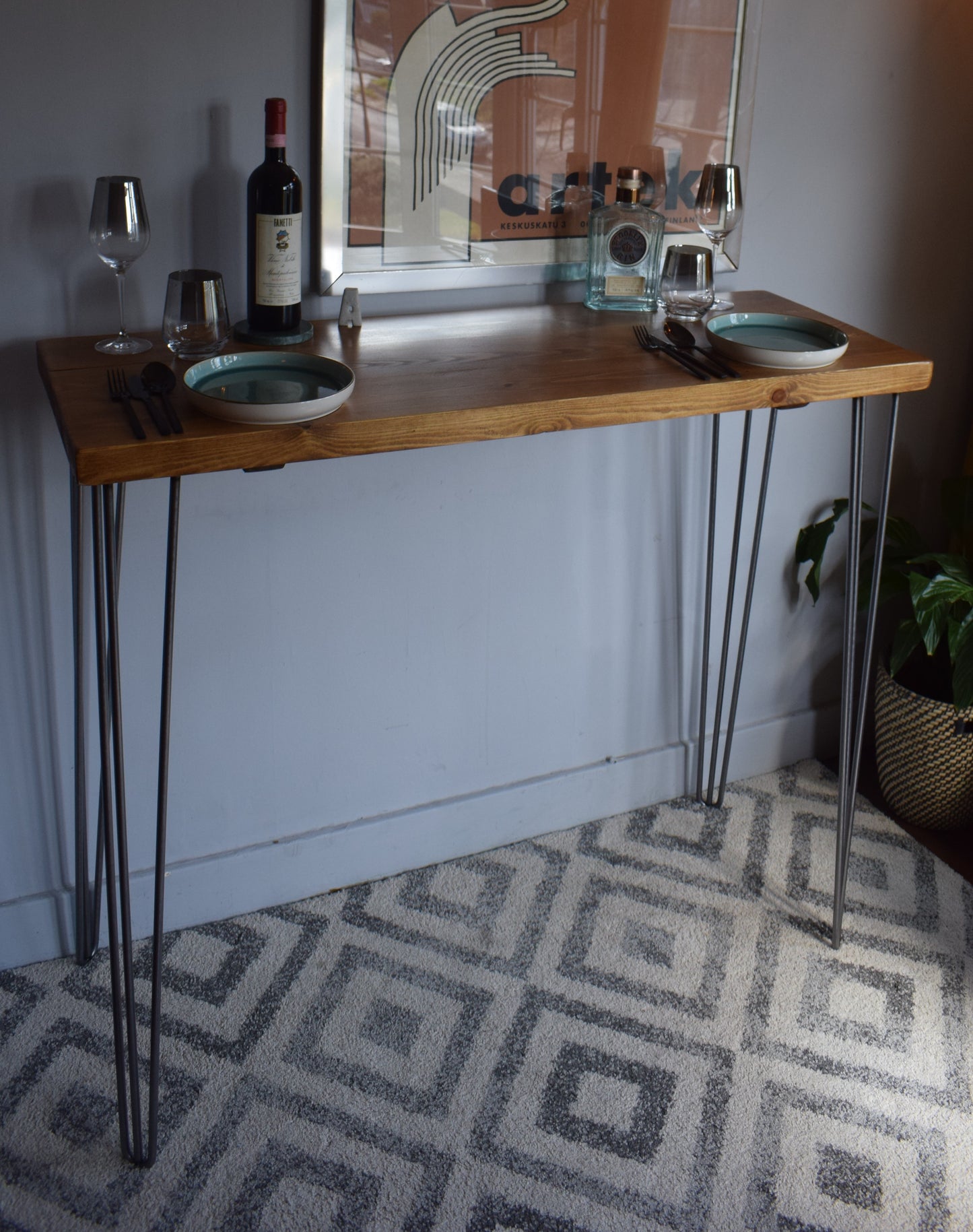 Industrial mid-century modern Scandi breakfast bar with sleek hairpin legs, perfect for a stylish and minimalist kitchen or dining area