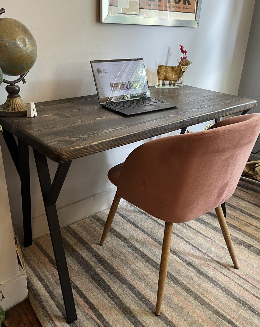 Industrial redwood pine desk with black steel legs and ebony finish, perfect for mid-century modern home office décor