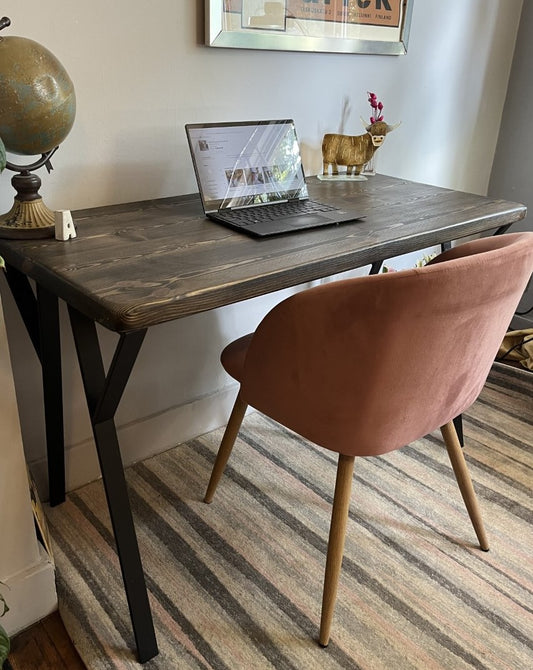 Industrial redwood pine desk with black steel legs and ebony finish, perfect for mid-century modern home office décor