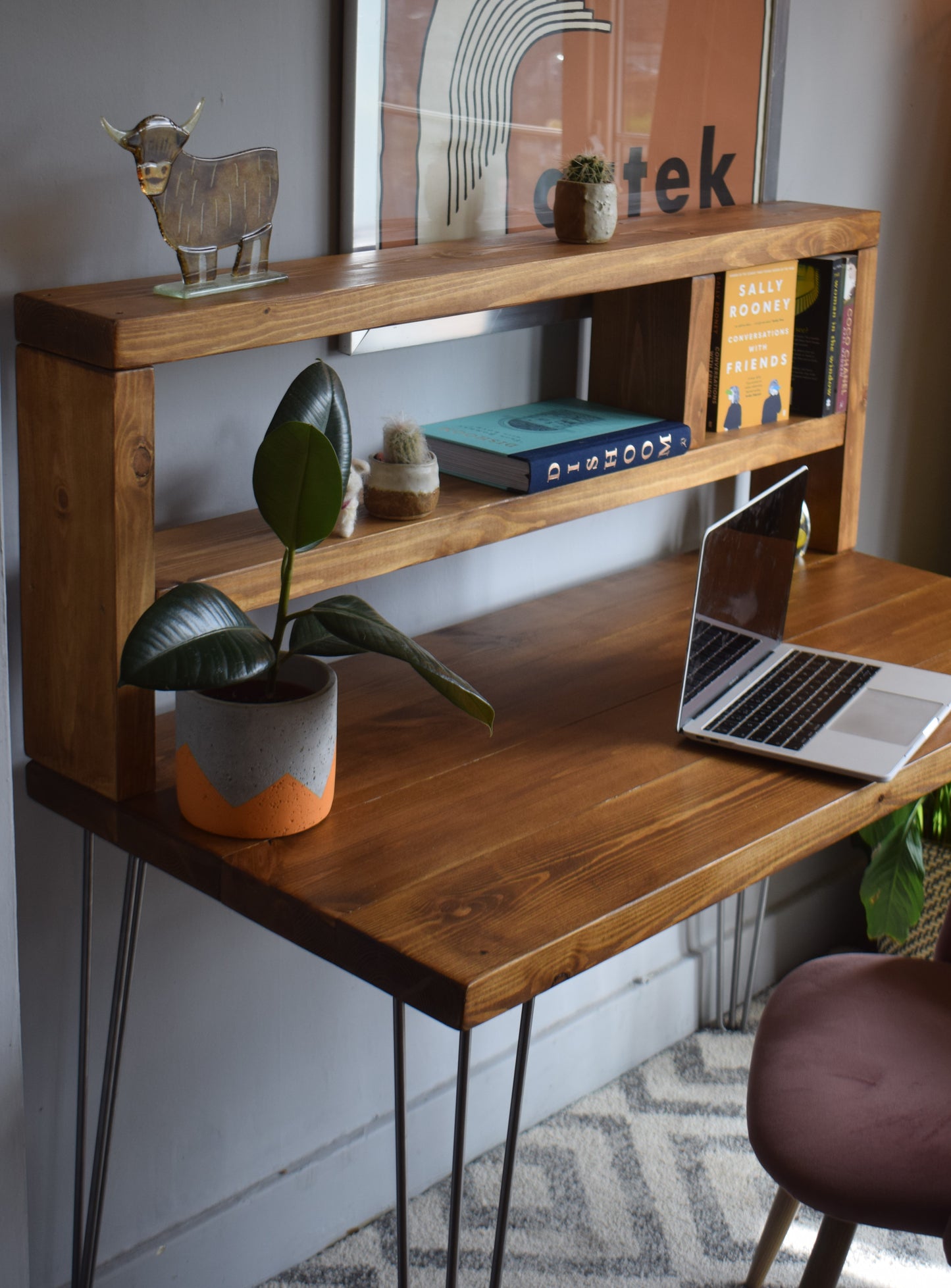 Handmade redwood pine desk featuring raw steel hairpin legs and a functional tall shelf.