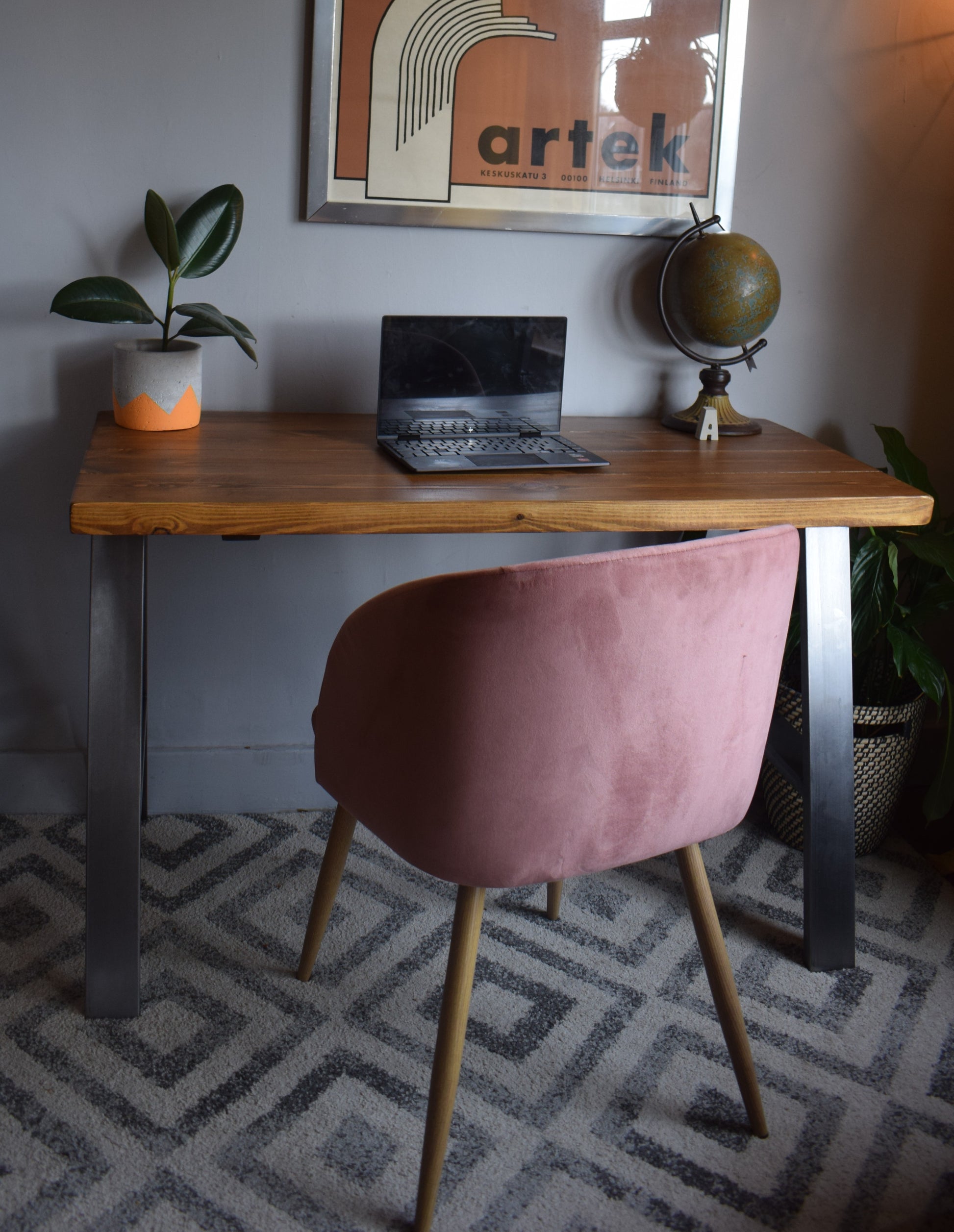 Stylish industrial redwood pine desk with steel A-frame legs, ideal for modern home office setups with a mid-century design