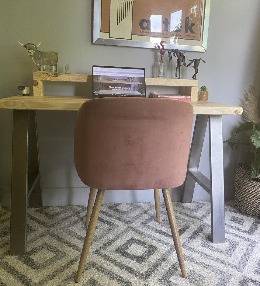 Redwood pine desk with steel A-frame legs and a mid shelf, combining industrial style with practical storage for home offices