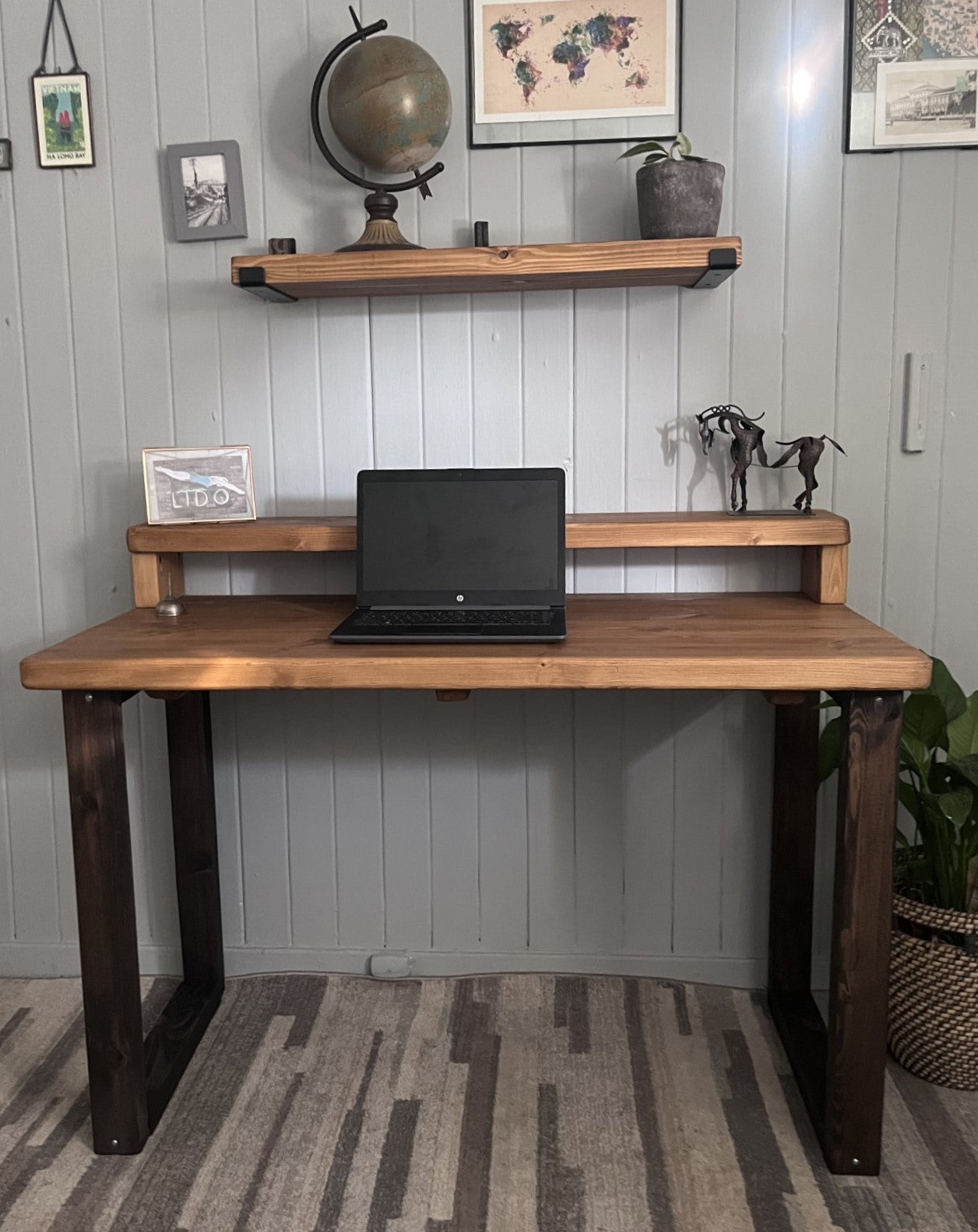 Industrial redwood pine desk with black wood frame legs and shelf for home office, mid-century modern style