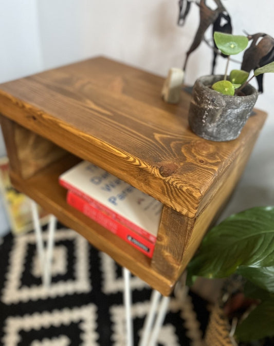 Chic redwood pine bedside table with white steel hairpin legs, perfect for modern bedrooms