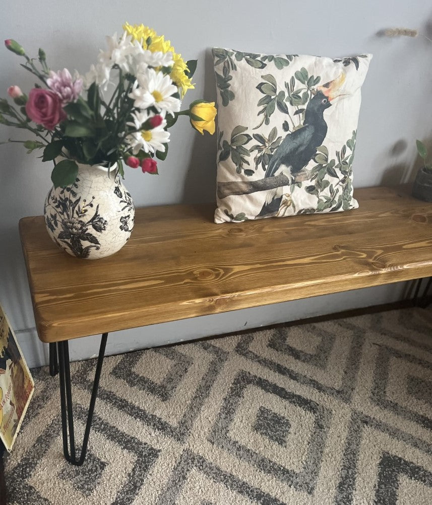 Industrial redwood pine bench with black steel hairpin legs, ideal for mid-century modern and industrial home