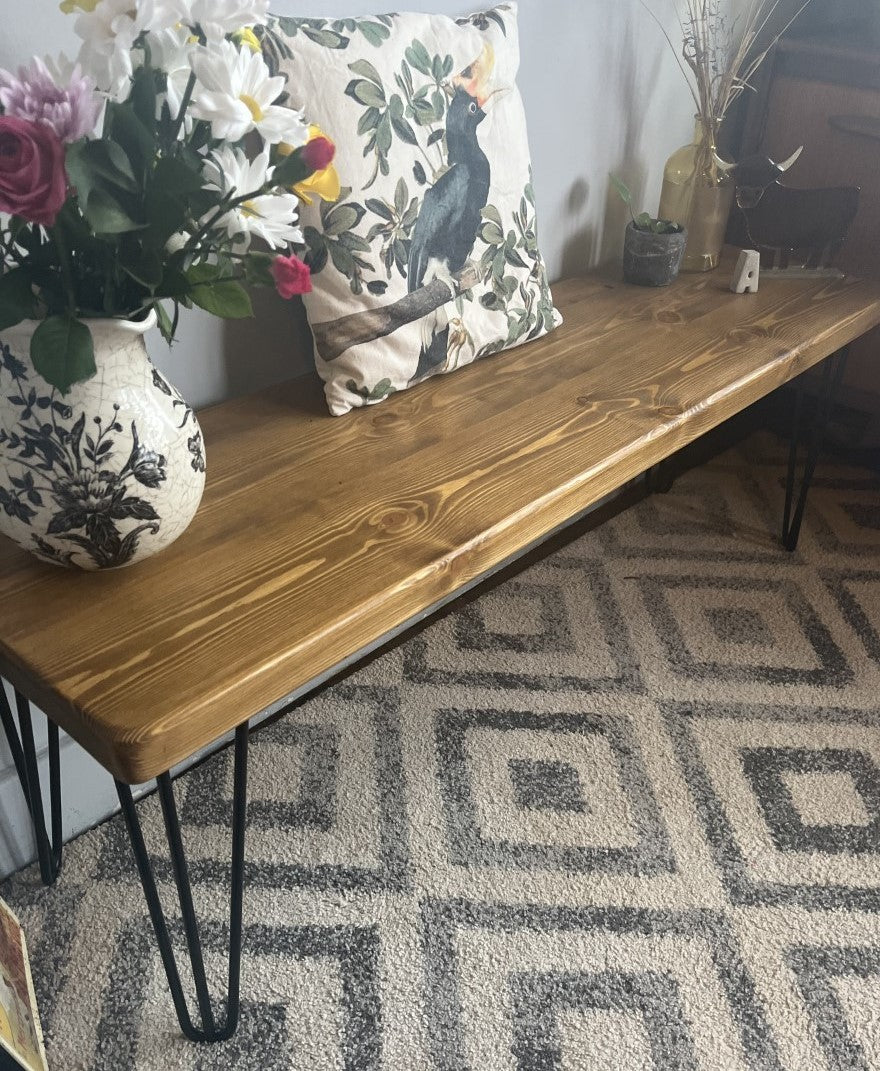 Industrial redwood pine bench with black steel hairpin legs, ideal for mid-century modern and industrial home