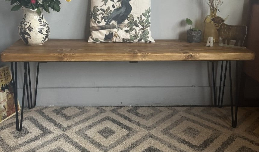 Industrial redwood pine bench with black steel hairpin legs, ideal for mid-century modern and industrial home